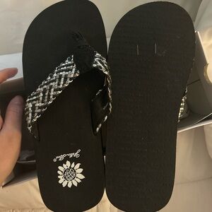 Black Braided Strap Flip Flops with White Logo